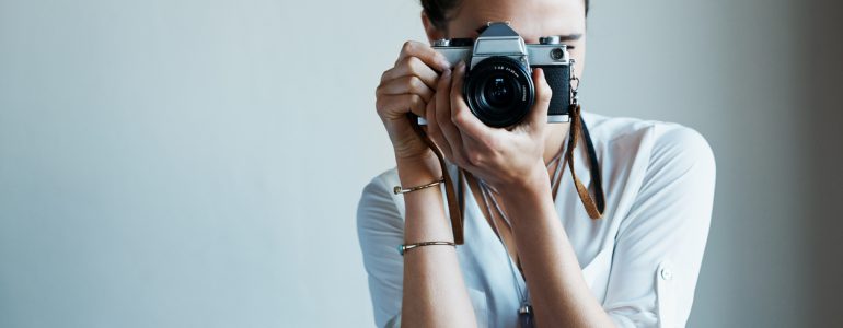 Fotograf med kamera